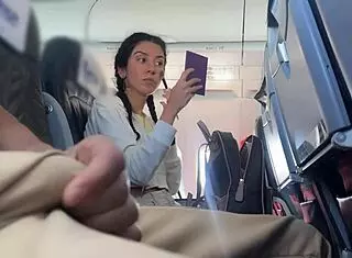 This teen amateur flashes her cute brunette pigtails on the airplane. She gives a quick public handjob leading to huge cumshot in just two minutes.