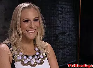 Busty blonde BDSM sub contrasts spanking with toy play in close-up bondage and whipping