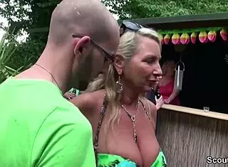 Scandalous German Cougar Seduces Young Guy At Garden Party