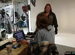 Attractive young model engages intimately with the photographer in storyline fantasy.