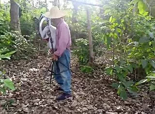 Hey that dirty old man is fucking his busty stepdaughter hard in the jungle with her big tits bouncing