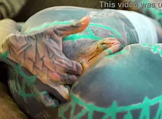 uh i'm that tattoo girl doin anal solo with xl dildo in fishnets highheels stockings piercin my asshole