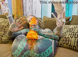 uh i'm that tattoo girl doin anal solo with xl dildo in fishnets highheels stockings piercin my asshole