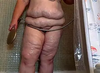 feeling so turned on by this big juicy fat ass white bbw milf in the shower, her huge pussy lips dripping wet with natural tits flashing