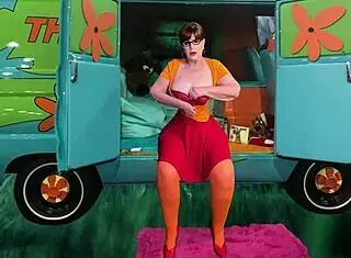 Oh man, I can't believe granny velma is deepthroating that fat cock like a pro sleuth!