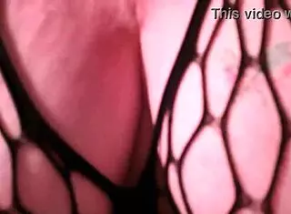 redhead mature dawnskye feels sexy in lingerie and fishnets