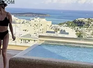 Daisy takes to the skies as a pilot, flashing her assets in a solo pool dance session. She teases with dirty talk and ass worship.