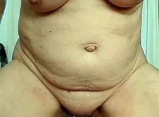 in this homemade video, a naughty housewife with natural tits swaps her dildo for intense orgasmic toy play