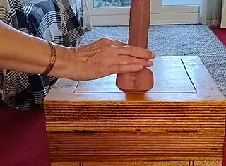 in this homemade video, a naughty housewife with natural tits swaps her dildo for intense orgasmic toy play