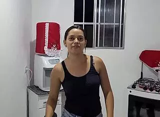 Delicious Brunette Teases Her Audience with Provocative Moves in Engaging Display