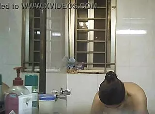 Voyeur spies on Indian bbw with big natural tits and fat curves in shower.