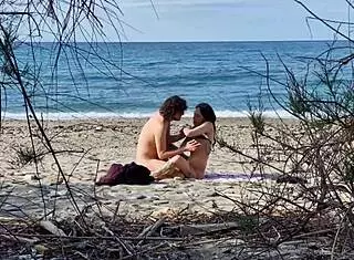 Beach sex ignites passionate lovers with female squirting orgasms at 7:40 and 13:25. Video captured using new telephoto lens for outdoor riding and creampie action