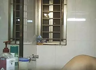 Voyeur spies on Indian bbw with big natural tits and fat curves in shower.