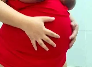 Pregnant Egyptian teen feels incredibly sexy and horny showcasing her belly in solo homemade scene