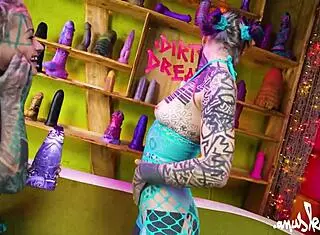 two tattooed goth lesbians dive into anal play using big dildo and vibrator for gapes. they spread shaved assholes wide leading to real orgasm.