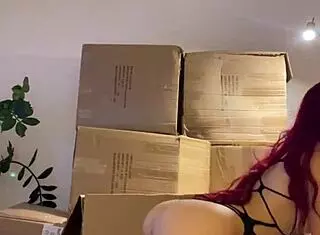 i'm a red haired teen beauty dancing sexy striptease and preparing sex machine with dildo in mouth