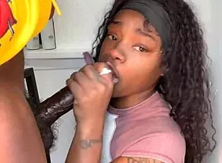 Stepbrother with 11 inch cock received a blowjob from Keisha Minaj. She finished with an intense cumshot in the encounter.