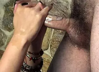 this hot colombian gives an oiled handjob with cum dripping from her long curly black nails in homemade interracial massage