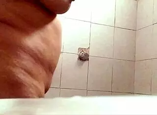 Voyeur Adventures Feature Busty Curvy Woman Taking Shower For Display