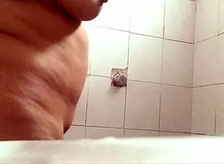 Voyeur Adventures Feature Busty Curvy Woman Taking Shower For Display