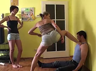 Dominant girls c slaves with feet? Mistress uses femdom domination in bdsm fetish scene.