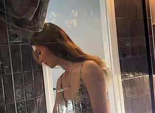 Petite College Cheerleader Teases In Bathroom Starting With Panties Then Reveals Tight Pussy Under Miniskirt