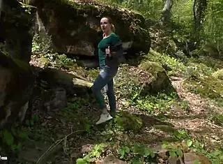 So this girl is walking in the forest and suddenly starts fingering herself after undressing publicly