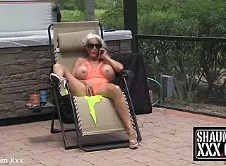 Sally D'Angelo, you got those gators ready? Mature granny takes massive black cock in interracial cumshot scene with big tits bouncing.