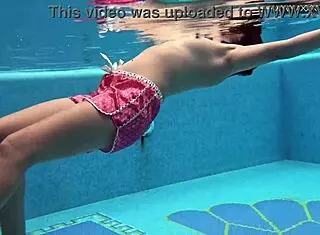 Lady Dee, cute shy Czech teen, swims in pool. She teases with tight petite body and juicy small tits outdoors.