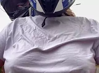 Motogirl from 99 picks up male passenger and asks him to rub her nipple tips while riding
