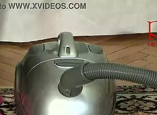 Maid Regina Noir cleans the apartment and dances with a vacuum cleaner. Is that teasing in her stockings and panties? 279 07 1