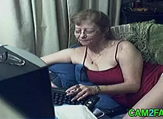 lovely granny with glasses reaches orgasm on webcam in solo session