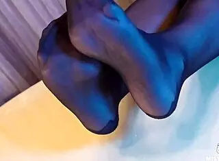 I tease you with my feet in black pantyhose and rose print heels goddess style