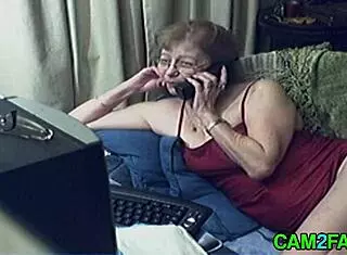 lovely granny with glasses reaches orgasm on webcam in solo session