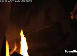 European teen slave receives a mark on her pussy in this intriguing bondage scene with lezdom mistress