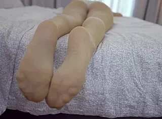 Sexy blonde teases with feet in nylons craving cum while spitting and dominating in barefoot femdom fetish