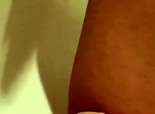 she teases her pussy with slow fingering in this solo session. the intense masturbation builds to a wild orgasm with shaking tits.