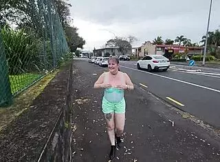 Trashy Kiwi slut flashes her tattooed body and pierced pussy at the mall! She teases on a busy public street like a dirty submissive bitch.