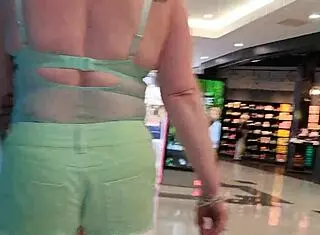 Trashy Kiwi slut flashes her tattooed body and pierced pussy at the mall! She teases on a busy public street like a dirty submissive bitch.