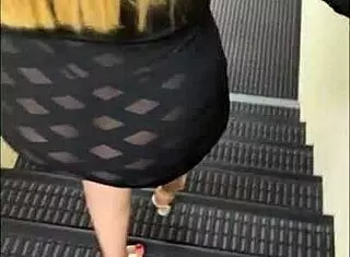 Amateur prostitute in see through short dress has fun with public blowjob and doggystyle in hotel areas with thong panties visible.