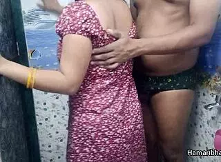 this indian desi bhabhi casually gives her husband an intense handjob in the bathroom, making him cum hard on her sexy blue panties