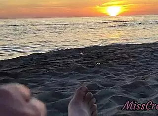 Flashing my cock in front of my stepdaughter at sunset in a public beach and she helps me cumshot in front of everyone - real sex risky