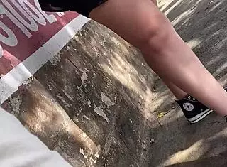 Bold latina teen 18+ flashes skirt in public outdoor with crossdressing pigtails and creampie socks