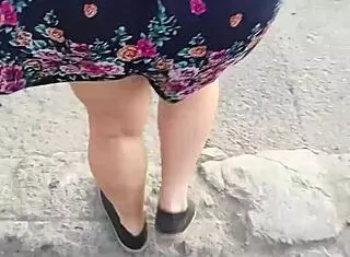 Hey, I follow and lift the skirt of this woman right on the street.
