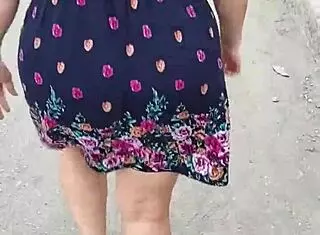 Hey, I follow and lift the skirt of this woman right on the street.