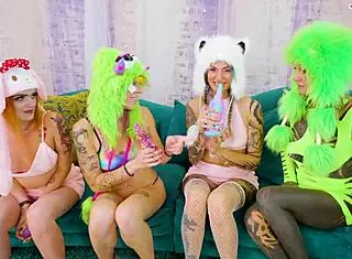 Tattooed sluts dive into a wild lesbian orgy with dildos and costumes. They ride vibrators to huge orgasms in goth style.