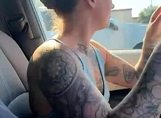 just a girl trying to adjust her sports bra properly in the gym parking lot