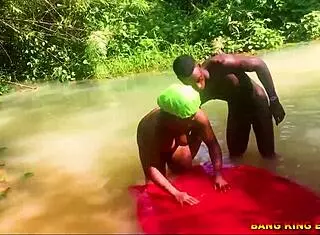 Hey, watch this hardcore bang with an African whore riding my big dick in the stream, she gets a wet pussy creampie