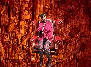 Hey, check out granny Peggy Sue sucking two cocks deep with a strapon twist