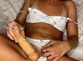 hey check this cute blonde latina beauty with blue eyes sucking and pounding her pretty brazilian pussy solo till she cums